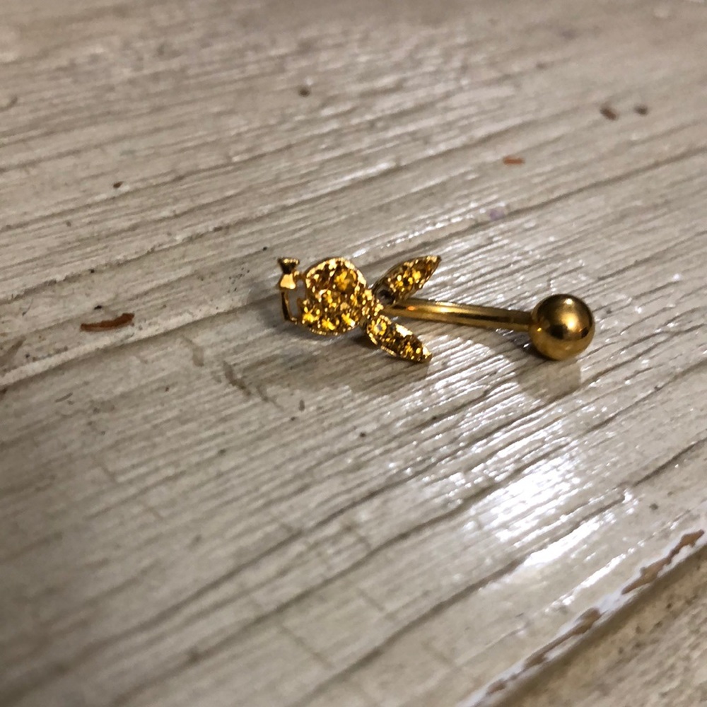 Playboy belly ring